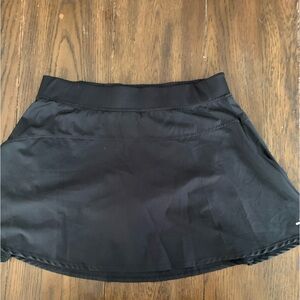 Skirt, black in color, size large